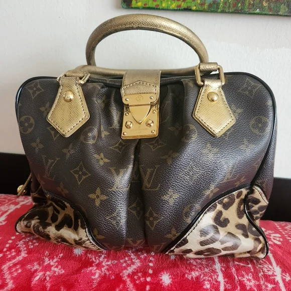 Limited edition Leopard Adele Louis Vuitton handbag.Strap included and D… - Picture 12 of 17